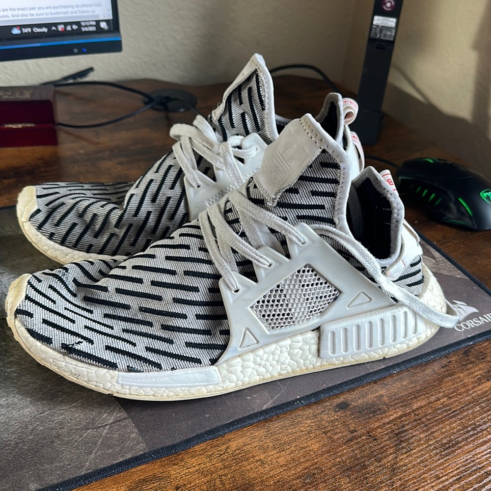 Adidas NMD XR1 Black and white shoes.